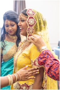 hindu wedding with gold and red sari