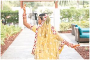 gold and red hindu wedding bride traditional sari